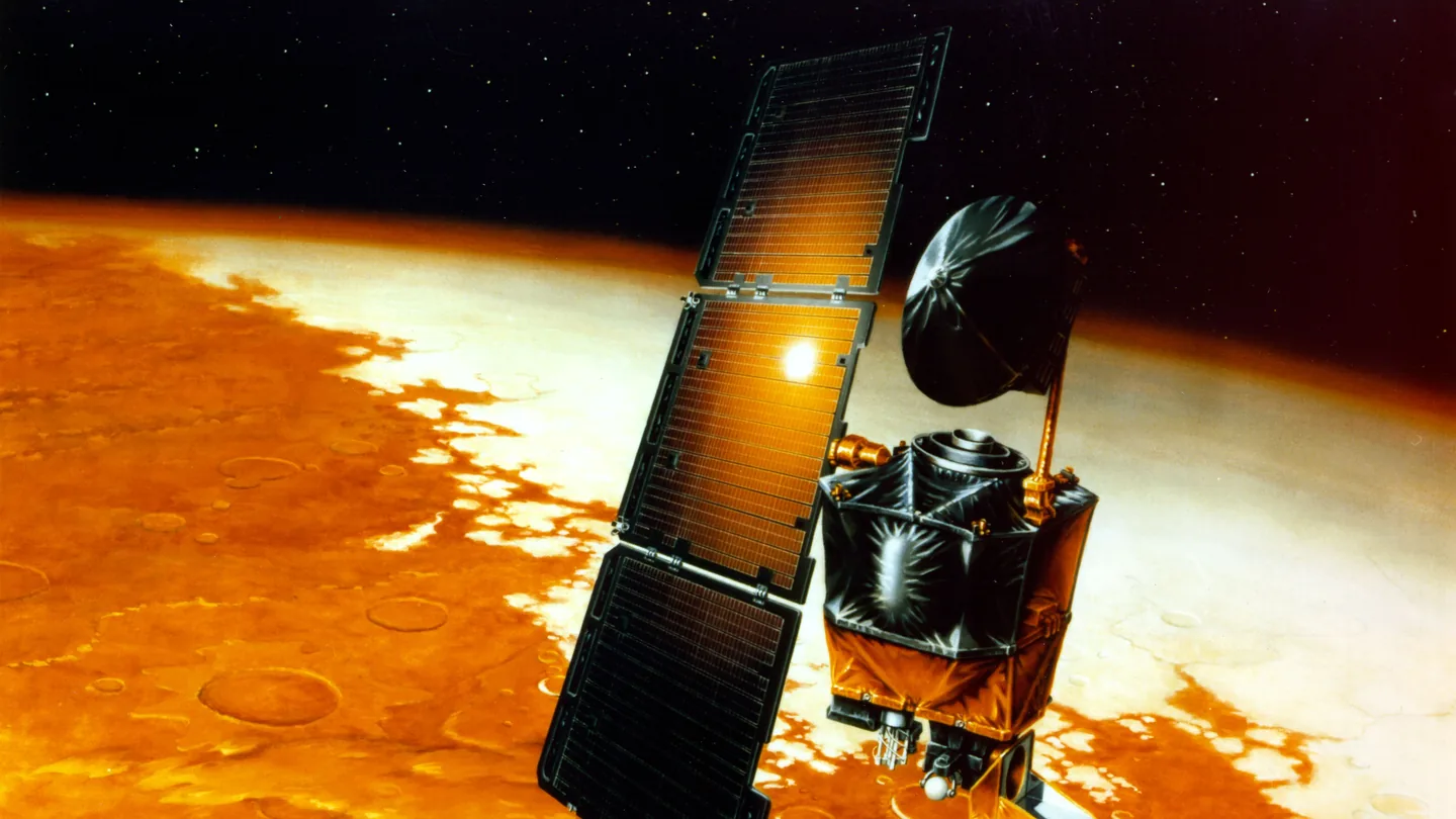 Artist's illustration of the Mars Climate Orbiter spacecraft above the surface of Mars